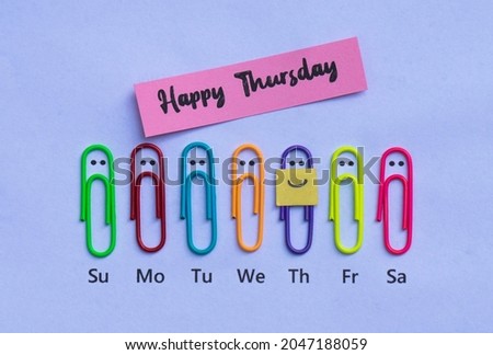 Cool wallpaper that says "Happy Thursday" with colorful paper clips and smiling expressions.