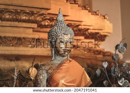 Buddha statue against golden background inside Wat Na Phramen or Wat Na Phra Meru Rachikaram in Ayutthaya, Thailand