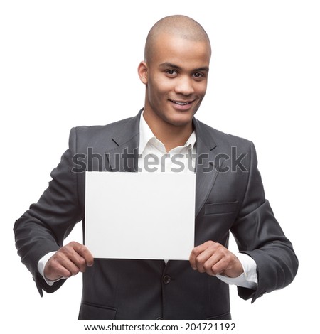 young cheerful black businessman holding sign isolated on white