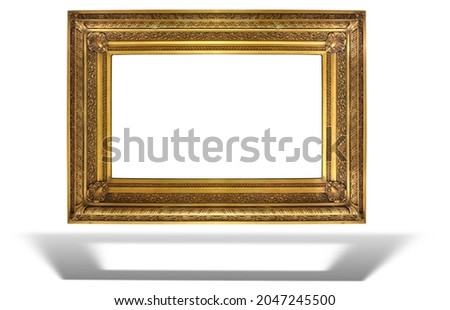 Old antique golden frame isolated over white background with shadow