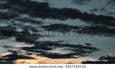 Colorful sunset sky and clouds, image twilight background. Abstract nature backgrounds. Dramatic blue and orange, colorful clouds at twilight time. Copy space for site