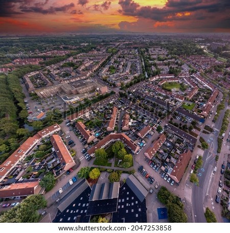 Zonsondergang Sunset over city of Purmerend shot by drone 