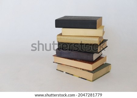 Stack of books on whie background