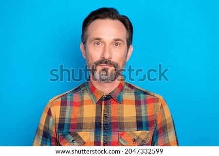 Photo of good brunet hairdo senior man wear yellow shirt isolated on blue color background
