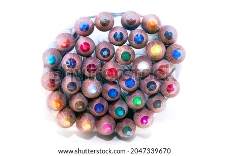 macro photography of crayons with different compositions using for commercial paintings drawings and making crafts with wood, concepts, ideas and creative things and posters and advertising