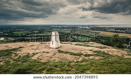 Enjoy breathtaking panoramic views from the rocky summit of Helsby Hill with its ancient defences, before crossing the valley to the tumbled ramparts of Woodhouse hill