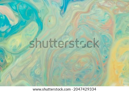 Abstract multicolored liquid background. Abstract ink design template mixed texture background. Psychedelic multicolored pattern. Fluid art