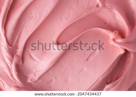 Pink icing frosting close up texture Royalty-Free Stock Photo #2047434437