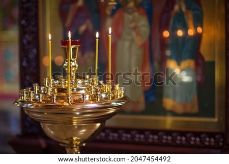 atmosphere in an Orthodox church, candle fire