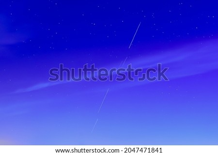 Starlink stellites in the  night sky.
