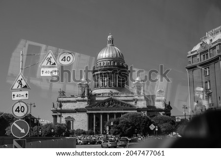 St. Isaac's Cathedral, one of the most beautiful places in Russia. The cathedral is located in the city of St. Petersburg. The photo shows the Cathedral, and next to the signs of the construction site