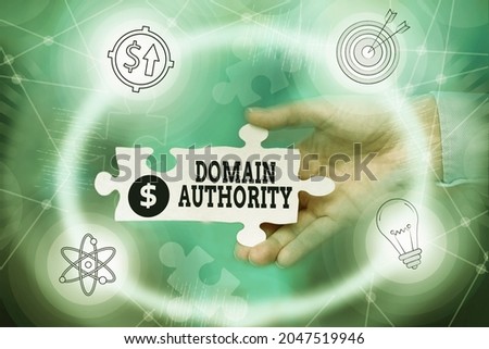 Writing displaying text Domain Authority. Word Written on calculated metric for how well a domain is likely to rank Hand Holding Jigsaw Puzzle Piece Unlocking New Futuristic Technologies.