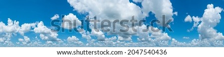 panoramic blue sky background with many clouds