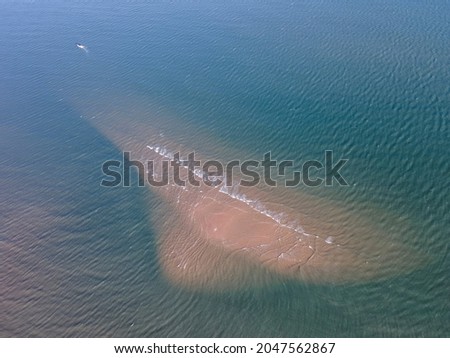 Aerial photograph of the beach and the blue sea