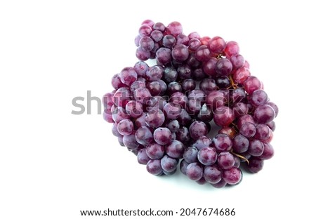 Grapes. Purple seedless grapes. Isolated fruit background on a white background.