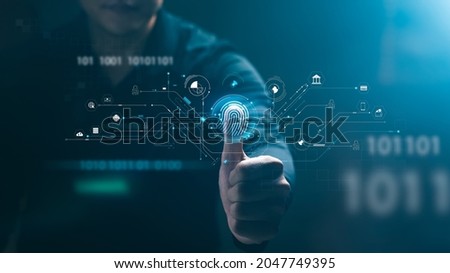 Security of future technology and Cybernetics on the Internet, finger scanning allows access to security and identification of big Data businesses, bank and Cloud Computers. Royalty-Free Stock Photo #2047749395