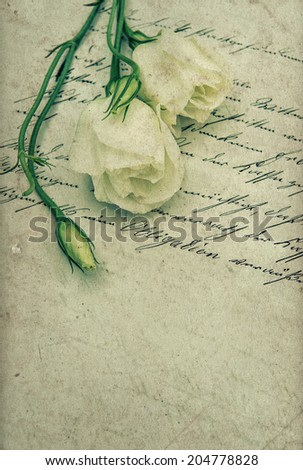 old handwritten love letter with flowers. nostalgic sentimental background. retro style toned picture