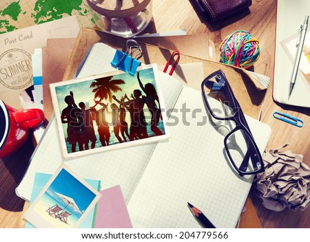 Desk with Summer Photographs and Notebook
