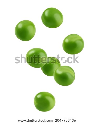 Falling green Pea, isolated on white background, clipping path, full depth of field Royalty-Free Stock Photo #2047933436