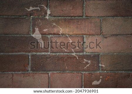 painted map of bahamas on a old brick wall