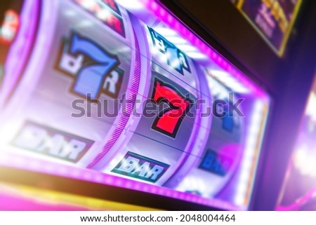 Gaming Las Vegas Classic Slot Machine. Gambling Industry Theme. Popular One Handed Bandit Game.  Royalty-Free Stock Photo #2048004464