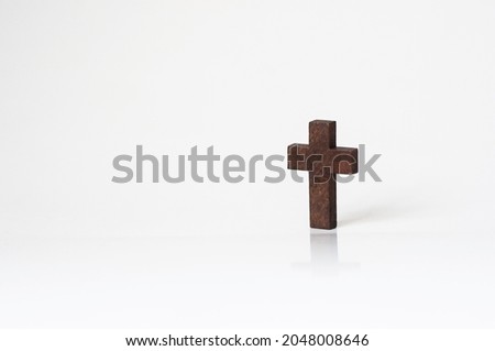 Small wood cross with copy space composition, believe and faithful.