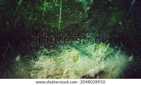 black, white anda green grunge background. dark green texture. alien texture background. dark green rough wallpaper