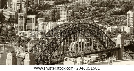 Black and white panoramic Sydney skyline.