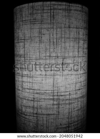 Textile Cloth in Black and White.  Profile view of a detailed macro photo of heavy canvas cloth for use as a cover or as a template.