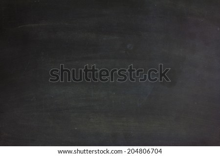 close up of a empty black dirty chalkboard 