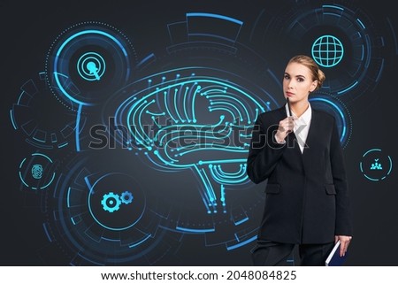 Serious businesswoman in formal suit is holding notebook in her hand. Digital interface with icons of brain, globe, search, social media, finger print, cogwheel in the background. Concept of promotion