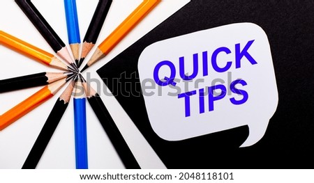 On a light background, multi-colored pencils and on a black background a white card with the text QUICK TIPS