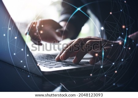 Social network connection, internet technology, digital software development, cloud computing concept. Software engineer working on laptop computer, virtual futuristic innovation network connection Royalty-Free Stock Photo #2048123093