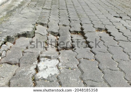 damaged public walkways  May cause danger to people passing by. Royalty-Free Stock Photo #2048185358