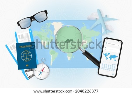 Conceptual illustration of a trip to Slovakia with travel gear. World map with compass, passport, tickets, cell phone, plane and glass.