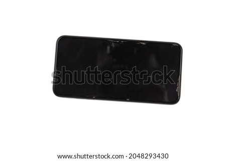 Smart phone with broken screen. isolated on a white background. Top view. 