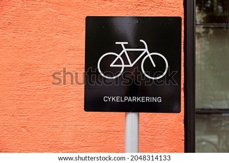 sign with the text: - bicycle parking 