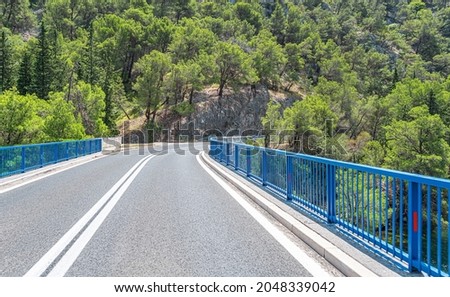 Highway blue bridge on the road. Skradin, Croatia.