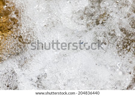 background of water in a turbulent river