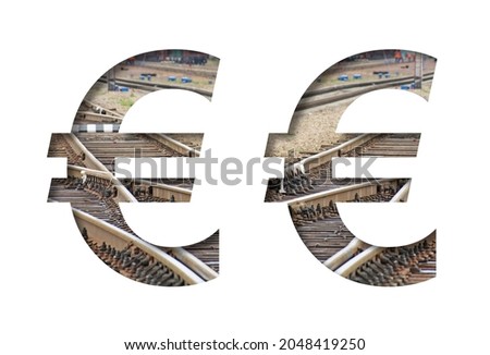 Railway font. Euro money business symbol is cut out of white paper against the background of railroad rails, mirror background for convenience. Decorative industrial alphabet.