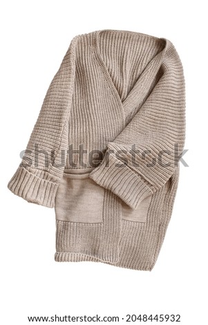 Oversized beige knit cardigan on white background Royalty-Free Stock Photo #2048445932