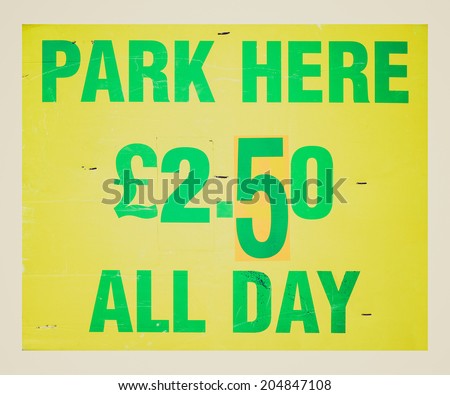 Vintage retro looking Sign 50p per hour 2.50 all day - isolated over white background