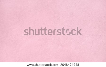 Abstract delicate pink Background, Texture. Empty wall of room is painted in pastel pink color. Textured light Surface. Soft Beautiful Web banner or Wallpaper With Copy Space