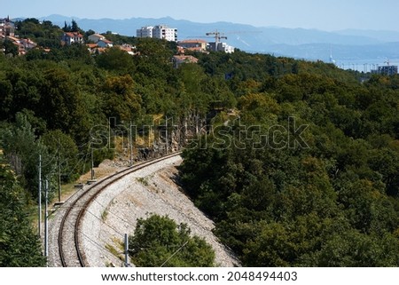 Railway tracks line railroad train rail aerial photo view portrait format transport. High quality photo Royalty-Free Stock Photo #2048494403