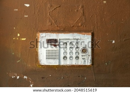 Doorbell button panel and intercom.