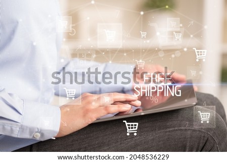 Young person makes a purchase through a tablet