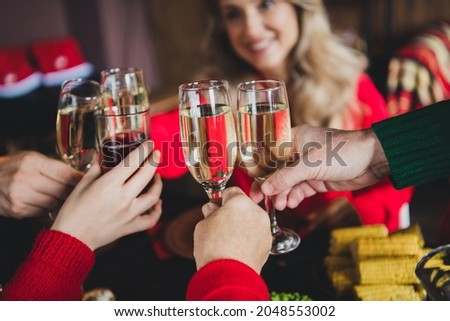 Photo of family friends wife husband retired pensioner grandparents noel sit big table clink glass toast x-mas indoors house