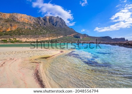 Amazing view of Balos Lagoon with magical turquoise waters, lagoons, tropical beaches of pure white sand and Gramvousa island on Crete, Greece Royalty-Free Stock Photo #2048556794