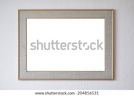Blank picture frame hanging on wall