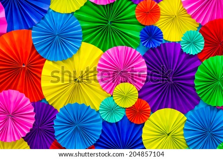 Abstract  of colorful paper filigree strips folded in waves Royalty-Free Stock Photo #204857104